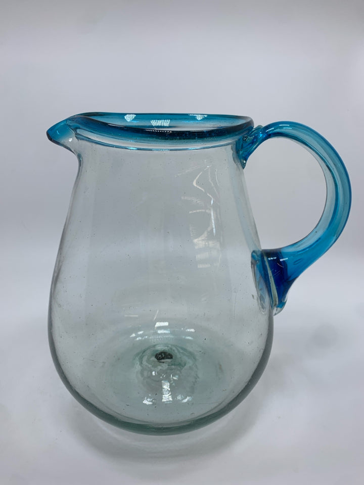 BLOWN GLASS PITCHER W/BLUE HANDLE.