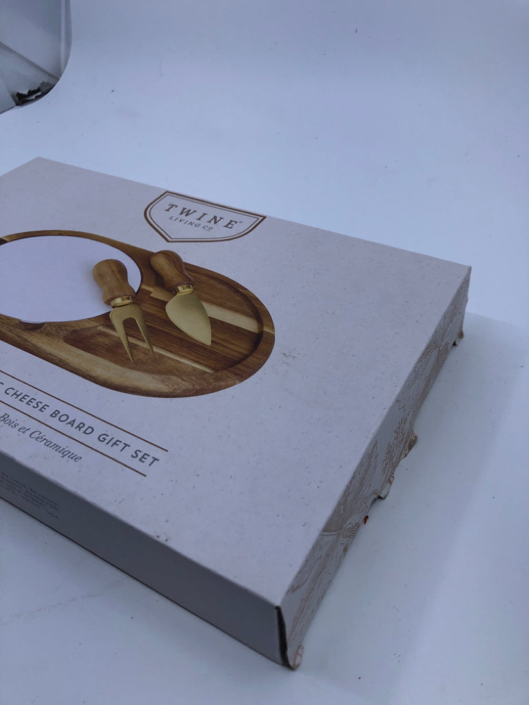 NIB WOOD AND CERAMIC CHEESE BOARD SET.