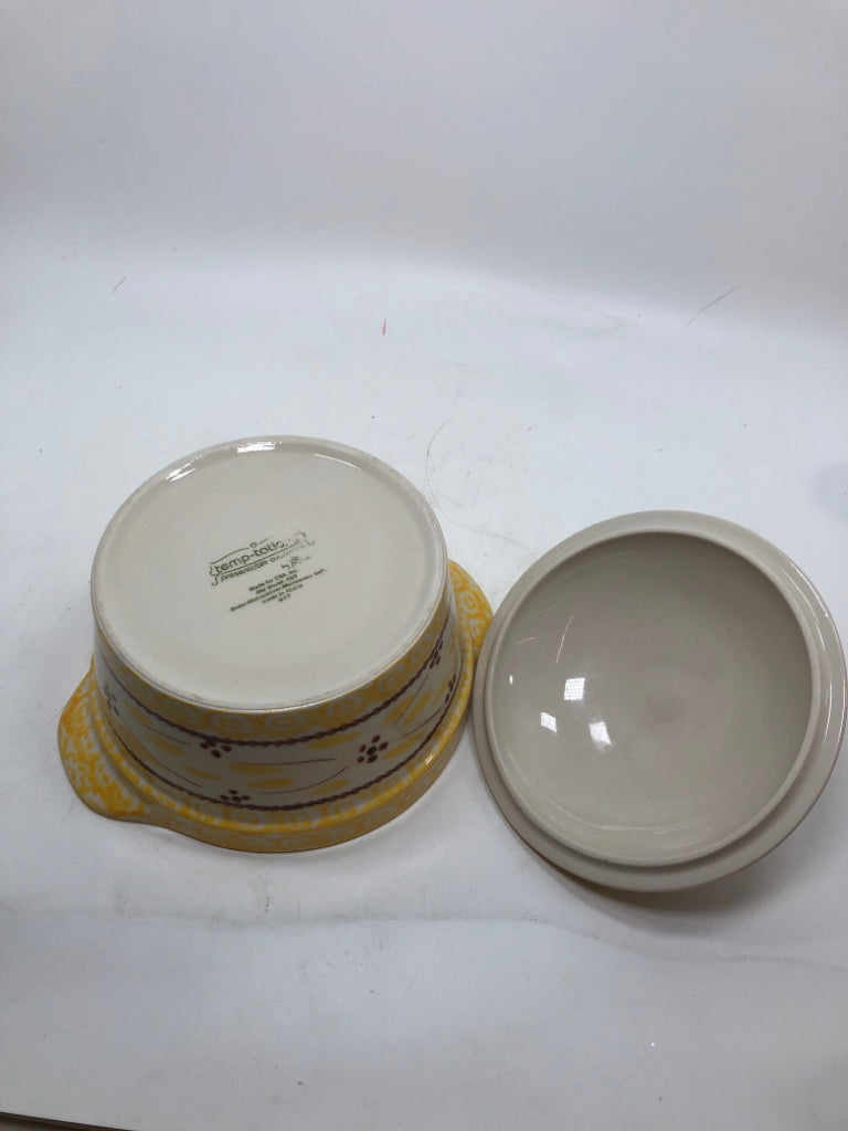 TEMPTATIONS YELLOW COVERED OLD WORLD DISH.