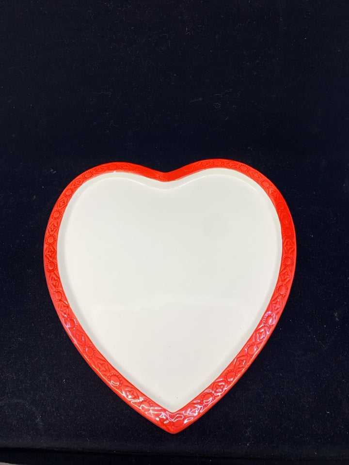 WHITE W RED RIM HEART SHAPED SERVING DISH.