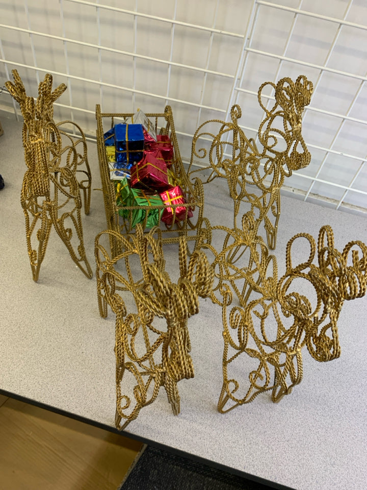 6PC GOLD METAL REINDEER AND SLEIGH SET.