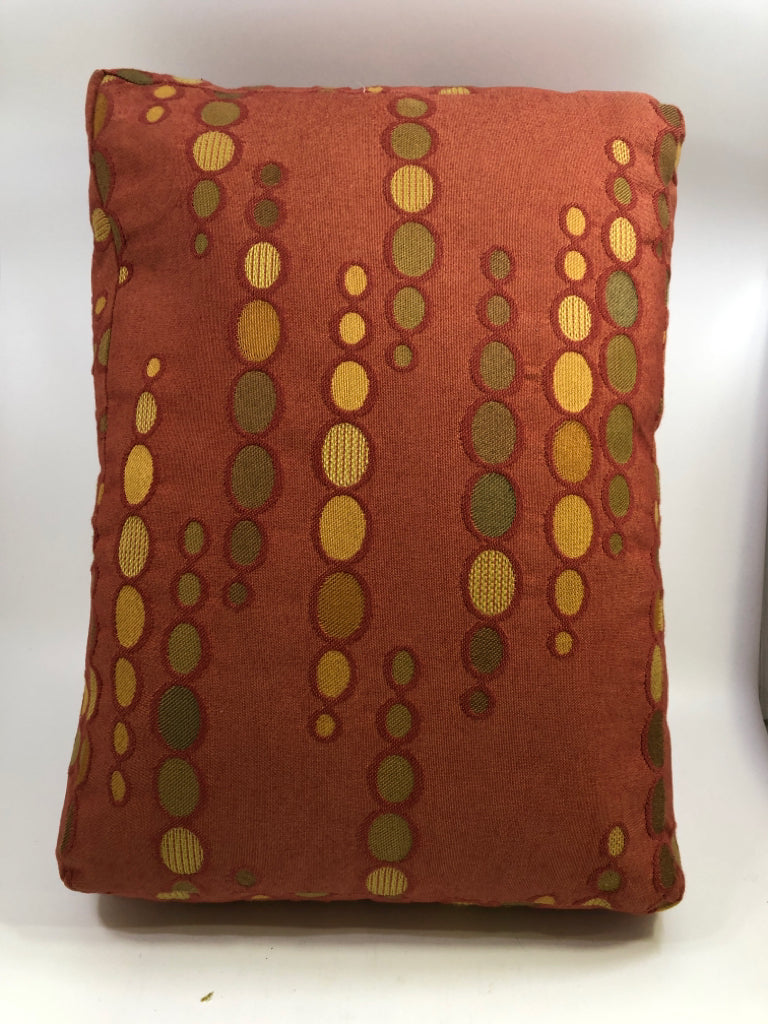 ORANGE RECTANGLE ACCENT PILLOW W/GREEN & YELLOW CIRCLES.
