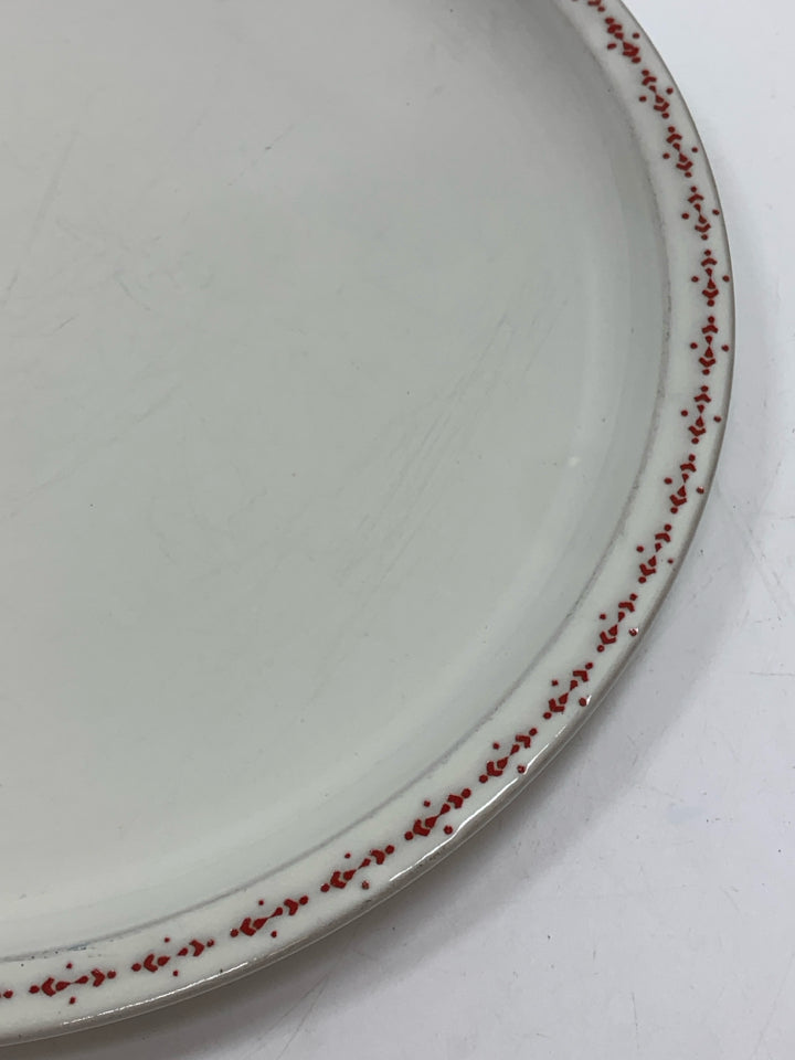 4 WHITE STONEWARE PLATES W/RED DOTTED RIM.