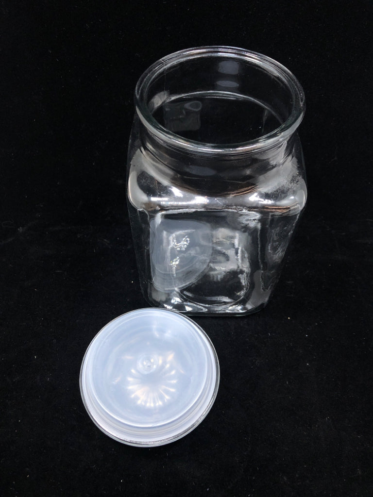 GLASS APOTHECARY JAR W/FLOWER LID.