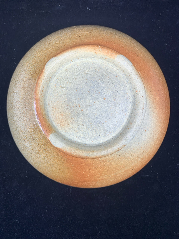 ORANGE AND GREEN POTTERY BOWL.