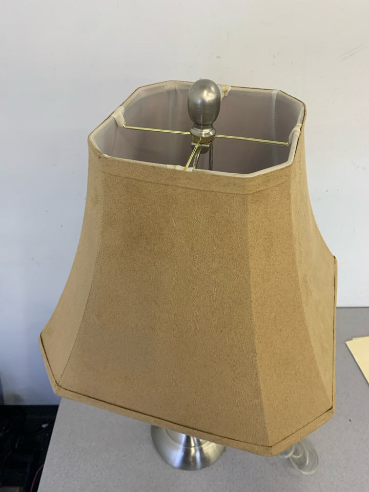 SILVER BASE LAMP W TAN SHADE.