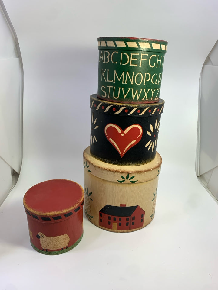 PRIMITIVE 4PC NESTING CYLINDER SHAPED BOXES.