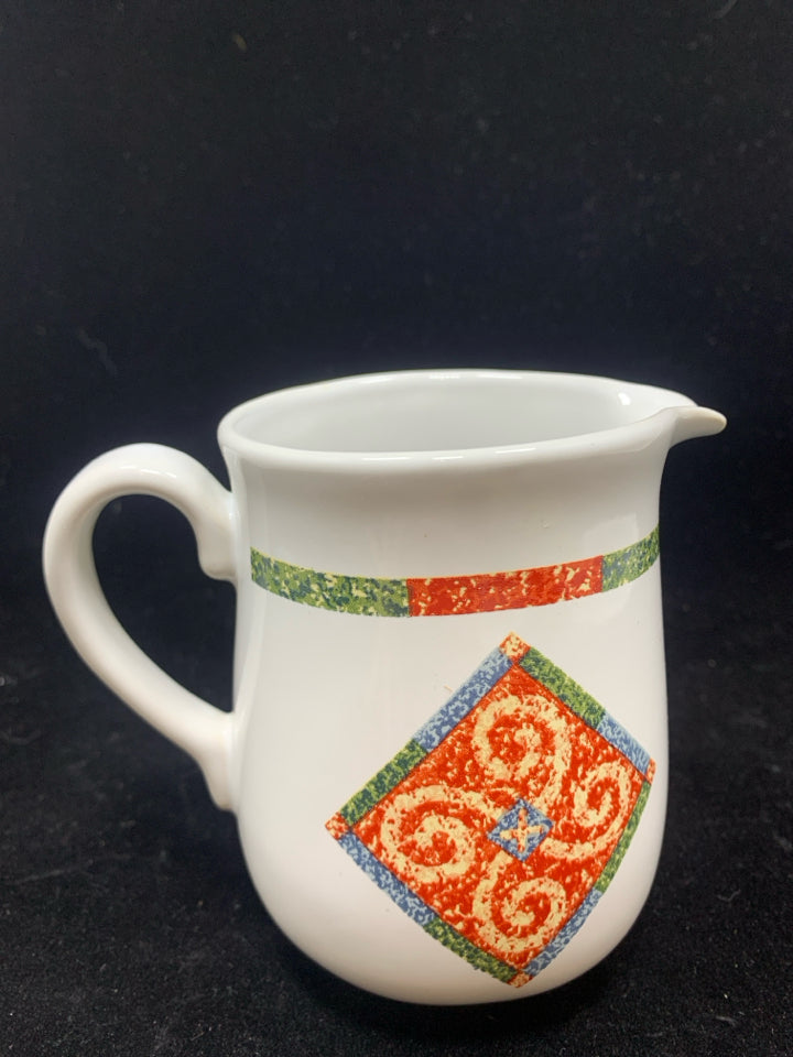 CORELLE SAND ART CREAMER.