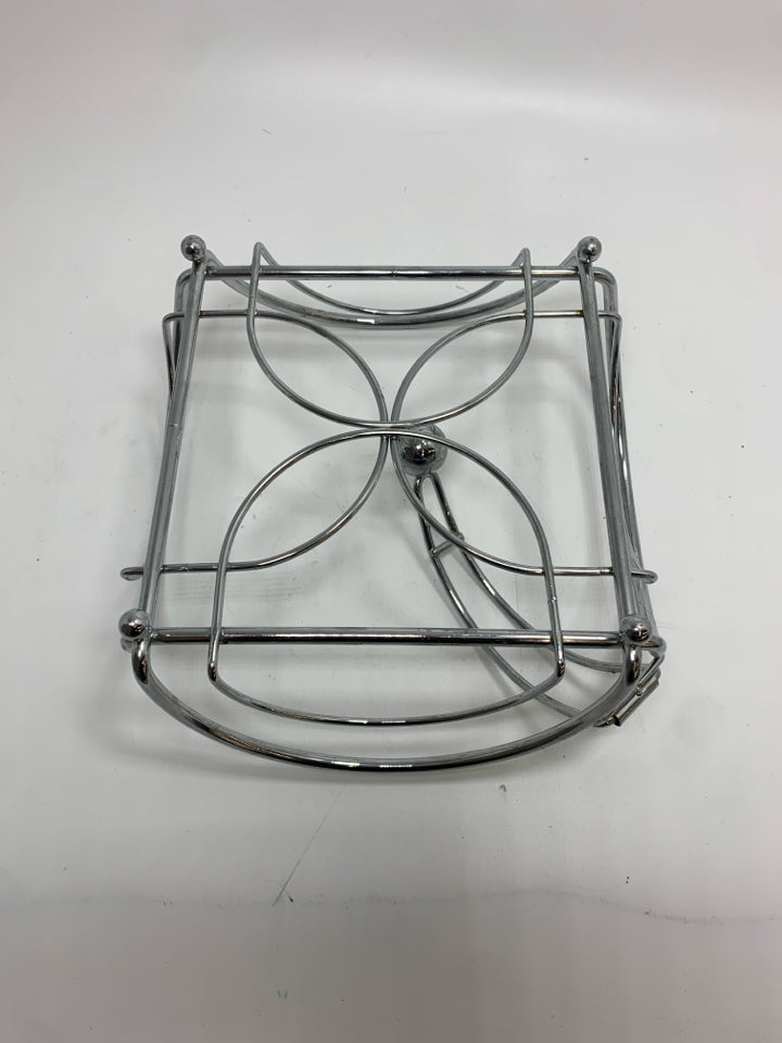 SILVER METAL NAPKIN HOLDER.
