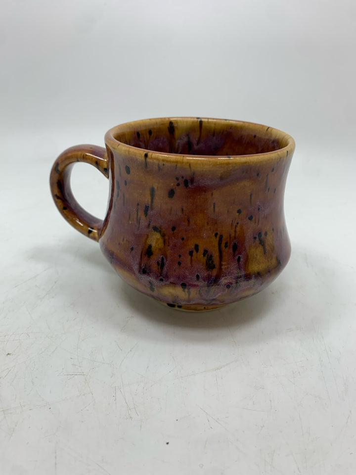 PURPLE GLAZED STONEWARE MUG W/BLACK SPECKLES.