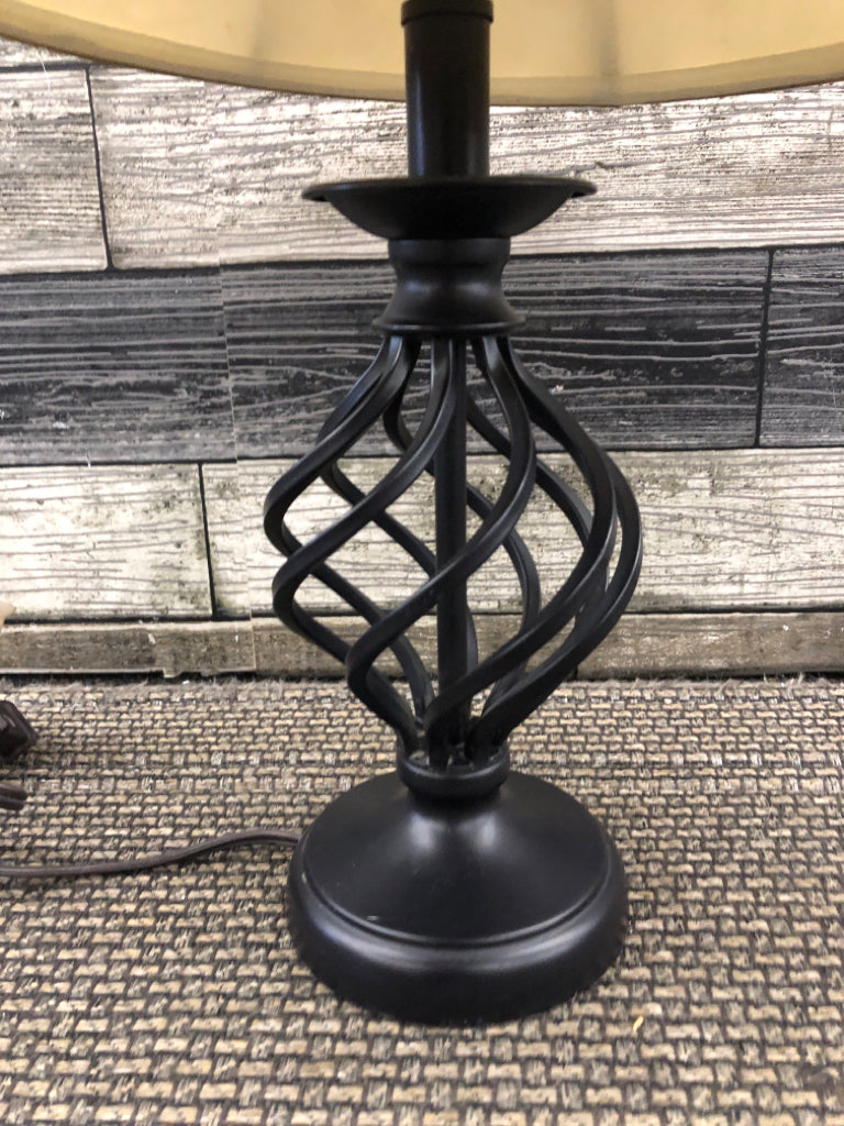 SWIRLED BLACK BASE LAMP W TAN SHADE.