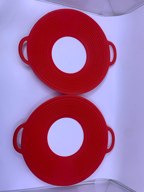ZEAL RED RUBBER MATS TO STOP POTS FROM BOILING OVER.