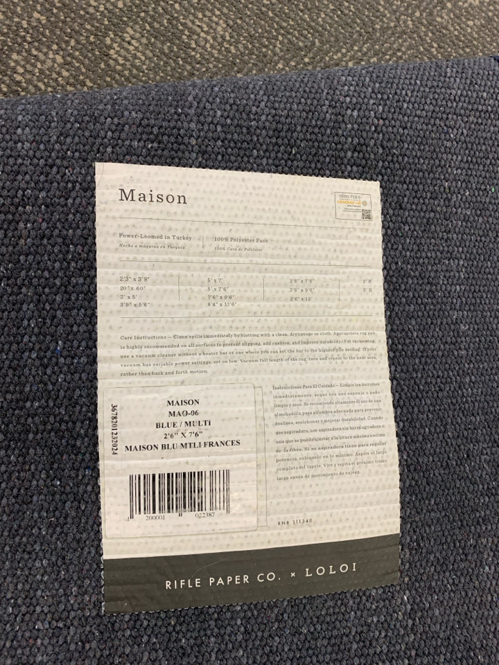 FLORAL AND NAVY BLUE RUG RUNNER.