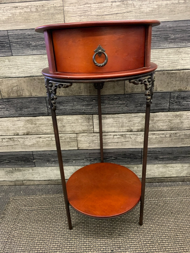VTG ROUND RED WOOD END TABLE W/ DRAWER.