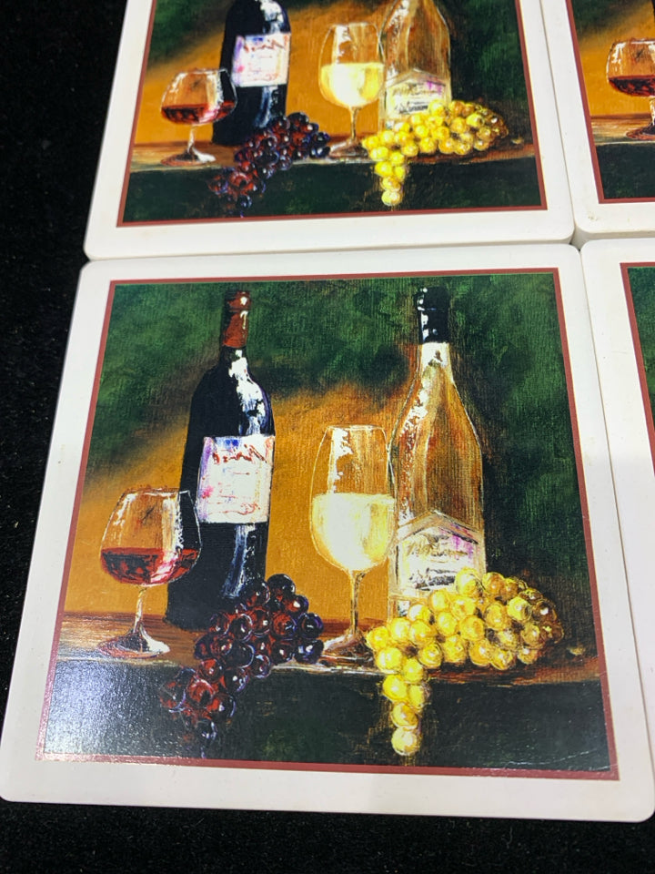 4 NIB WINE BOTTLES STONE COASTERS IN STAND.