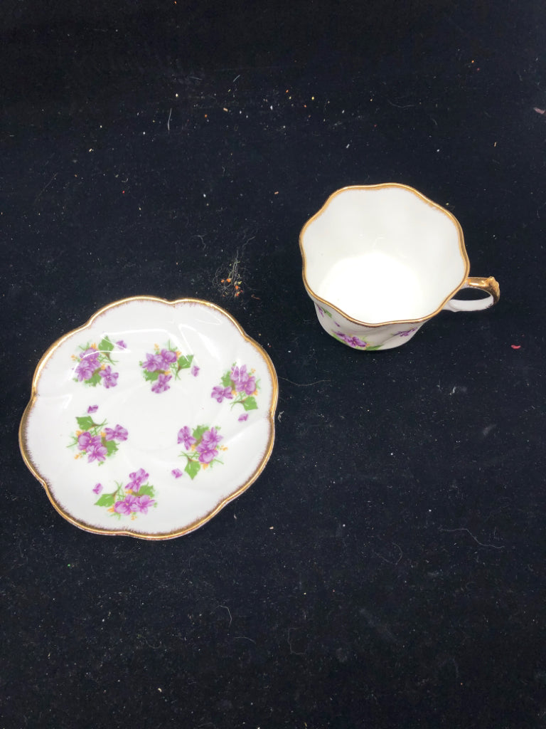 VTG PURPLE FLORAL TEA CUP AND SAUCER.