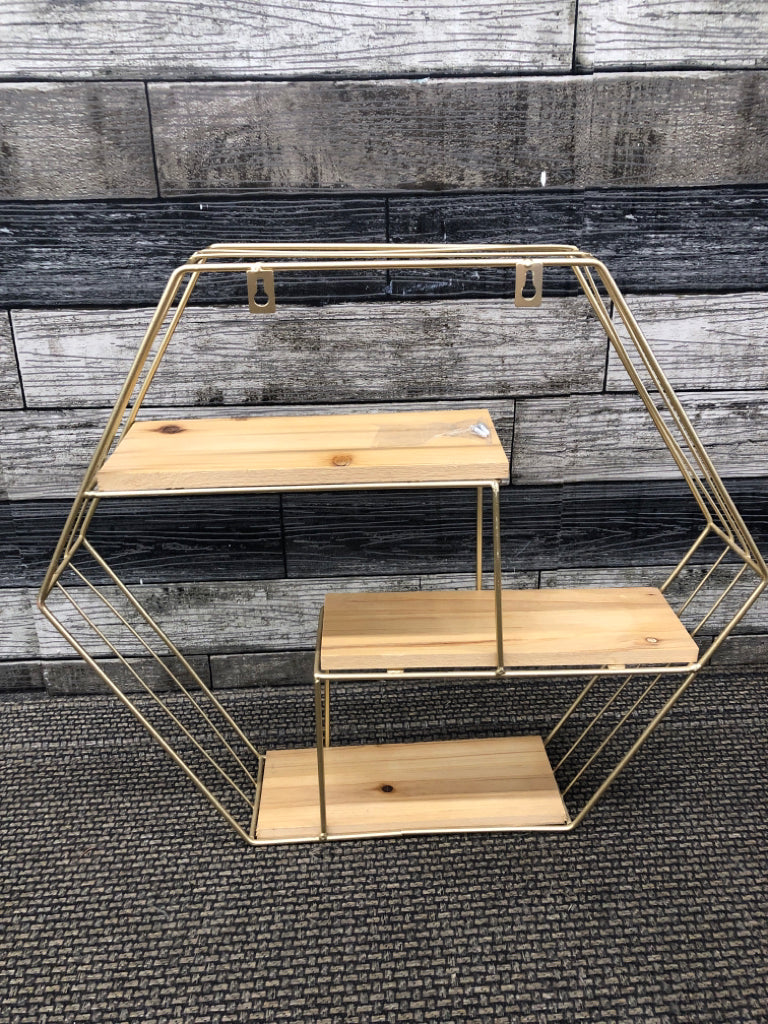GOLD HEXAGONAL WALL SHELF.