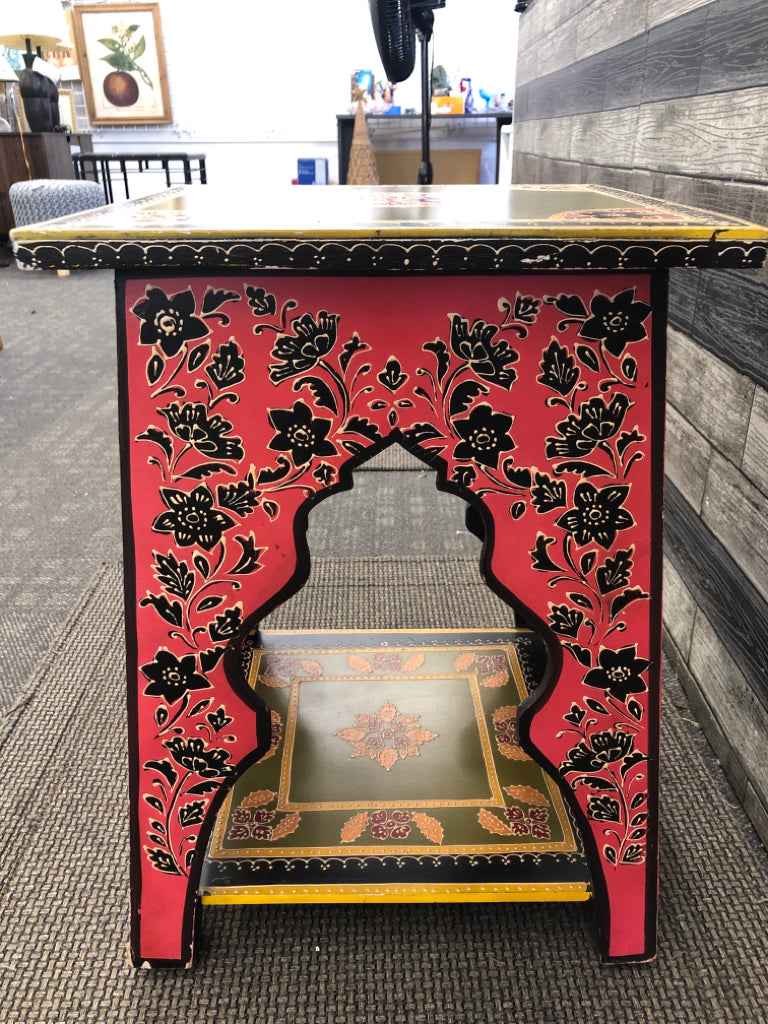 COLORFUL END TABLE W/GREEN TOP & YELLOW BASE & FLORAL LINEWORK.