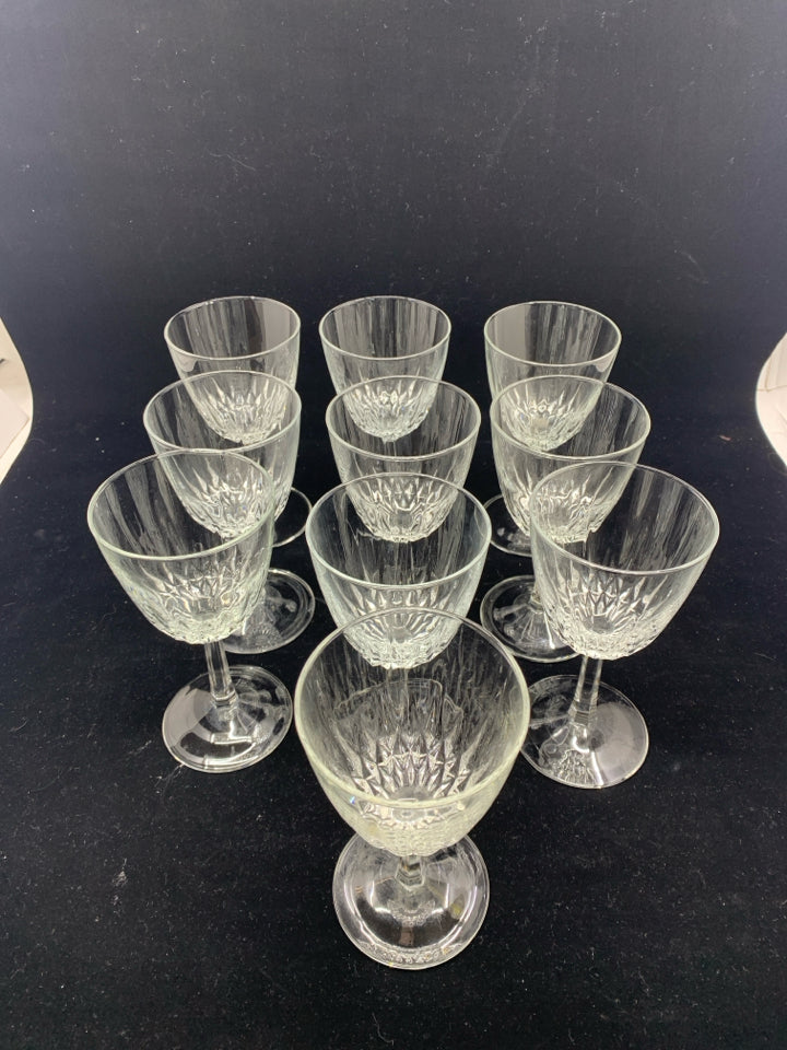 10 FOOTED CUT GLASS WINE GLASSES.