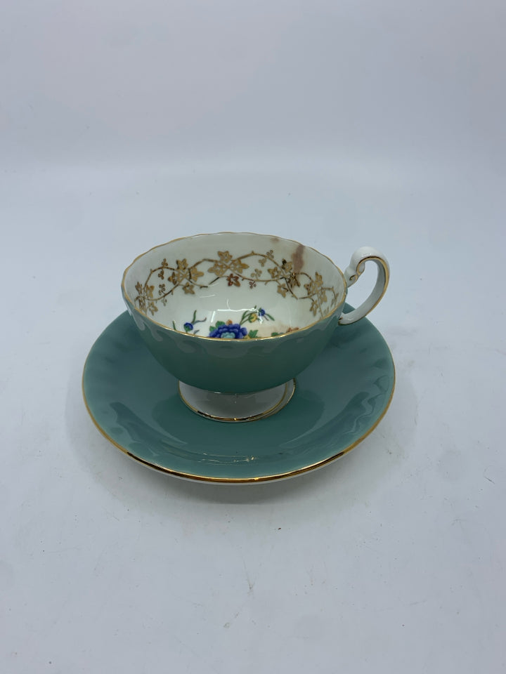 VTG TEAL FLORAL TEACUP AND SAUCER.