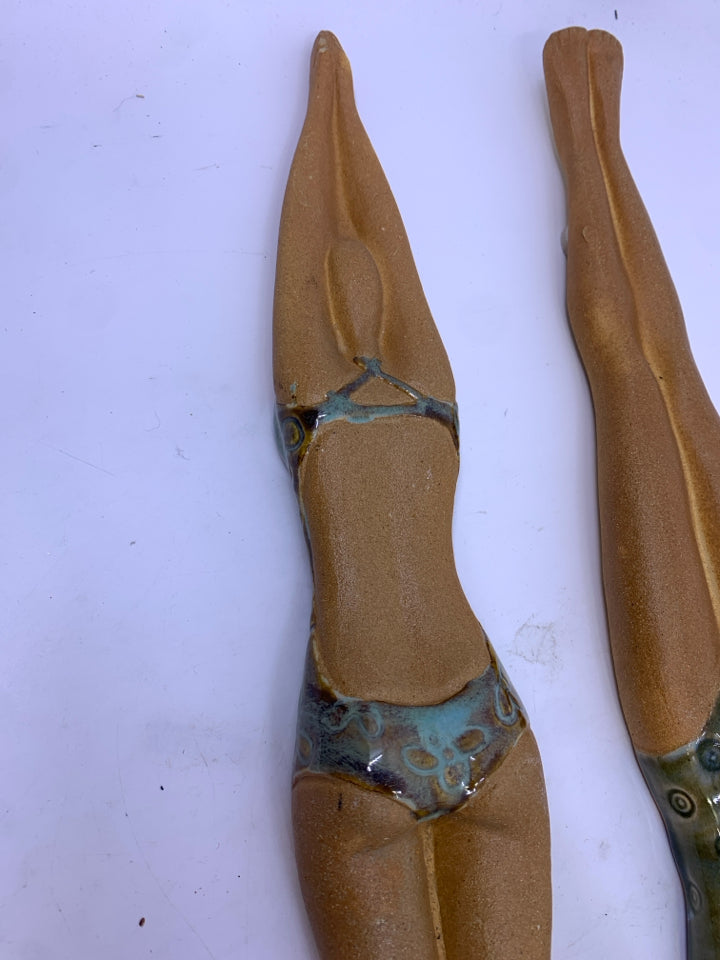 2 CERAMIC WOMAN SWIMMER IN BATHING SUITS WALL ART.