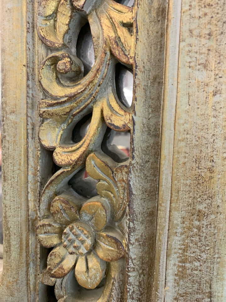 DISTRESSED TEAL MIRROR W/FLORAL ACCENTS.