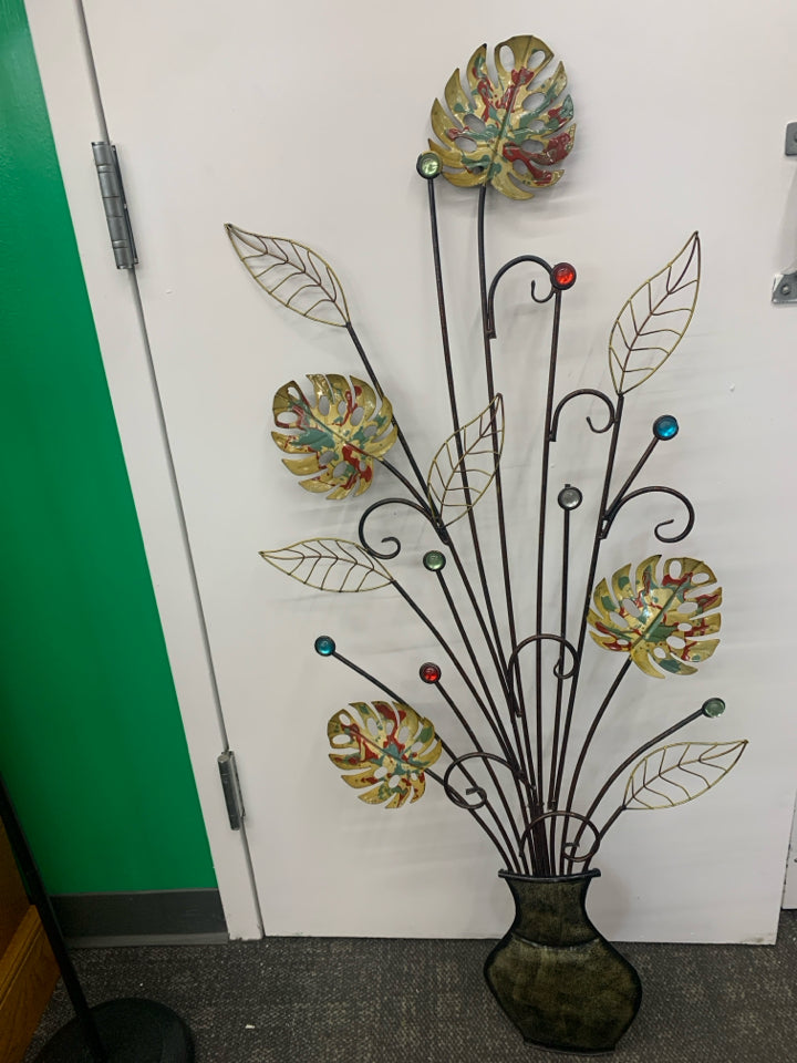 METAL LEAVES AND POT W/JEWELS WALL HANGING.
