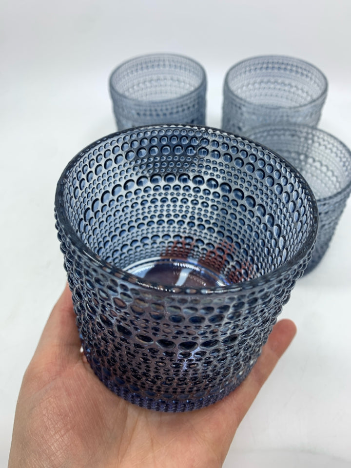 4 TEXTURED BLUE GLASS TUMBLERS.