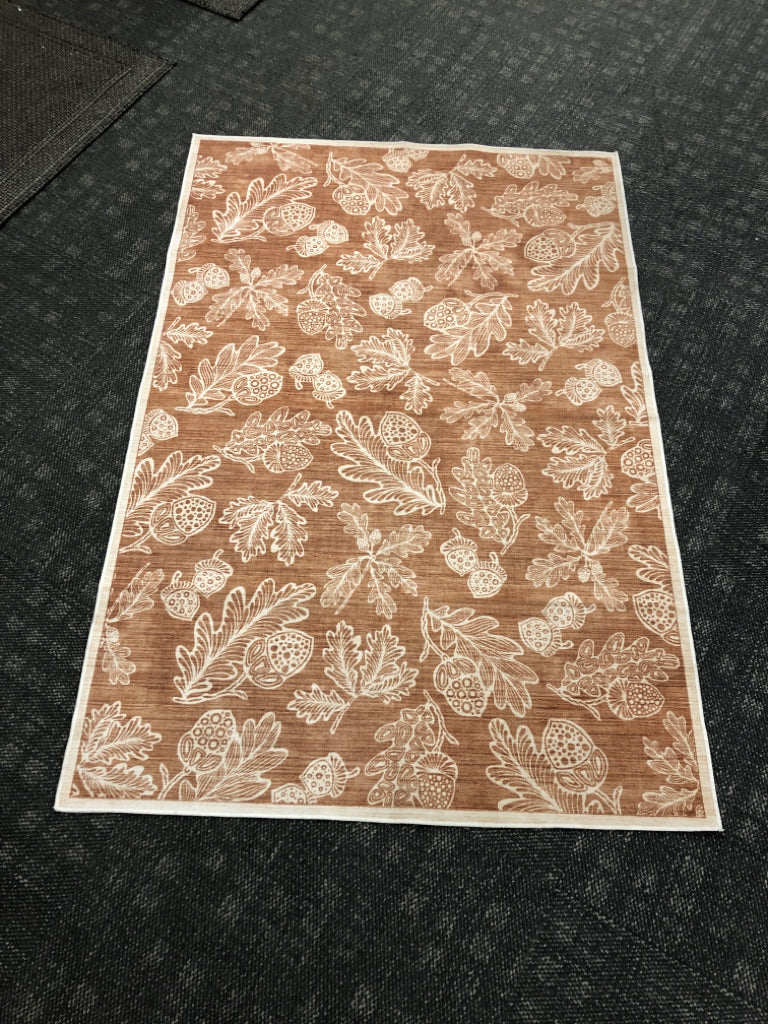 STUDIO BELLE ACORN + LEAF RUG.