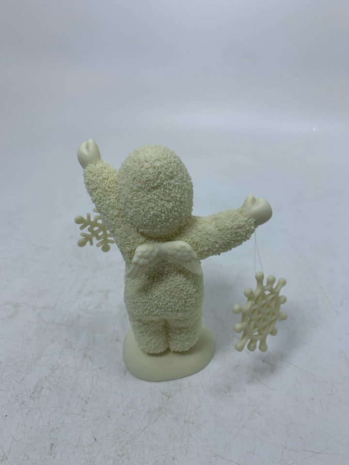 BABY HOLDING SNOWFLAKES SNOWBABIES.
