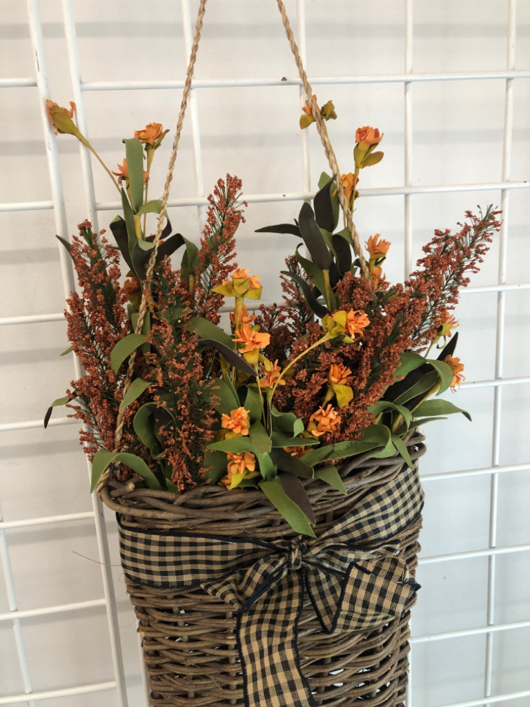 FAUX FALL FOLIAGE IN DRK BASKET WALL HANGING.