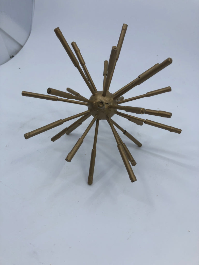 GOLD STARBURST DESK DECOR.