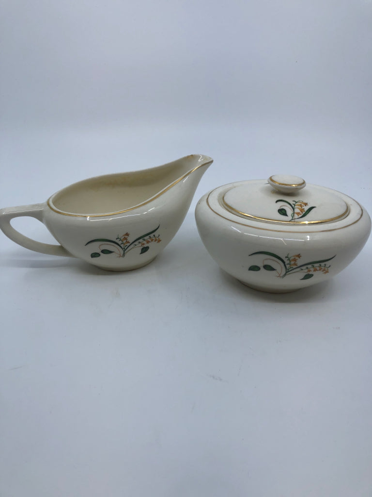 VTG YELLOW AND GREEN FLORAL CREAMER AND SUGAR.