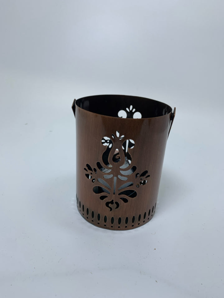 COPPER METAL COLORED PIERCED TEA LIGHT LANTERN CANDLE HOLDER.