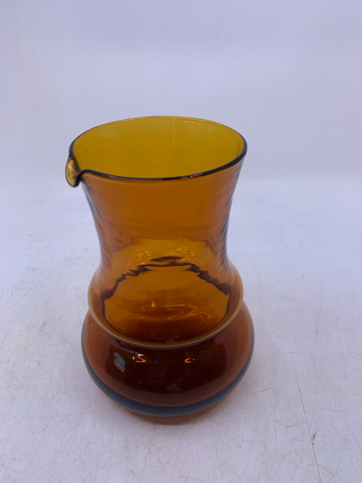 BROWN GLASS PITCHER VASE.