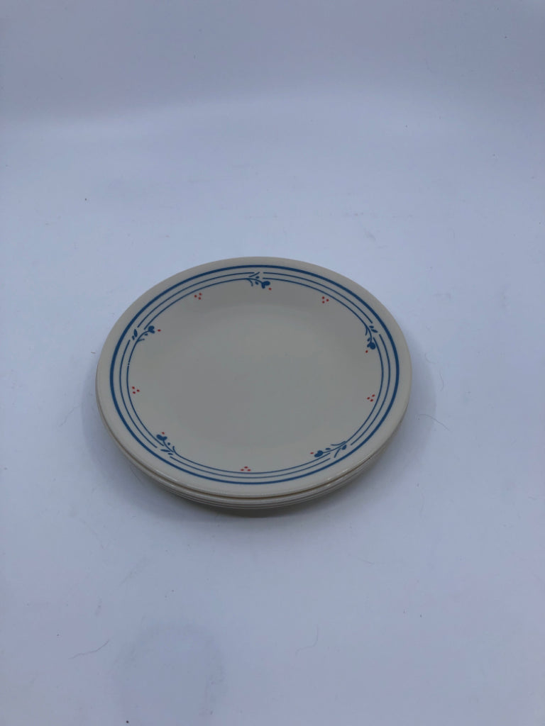 4 BLUE AND RED FLORAL TAN CORELLE SMALL PLATES.