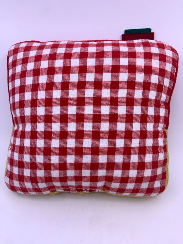 "HOME FOR" RED ACCENT SWEATER PILLOW.