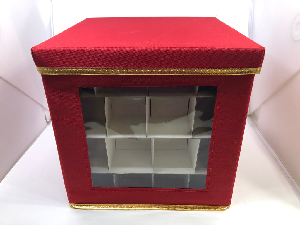 RED STORAGE BOX W GOLD TRIM, LID, AND HANDLES.