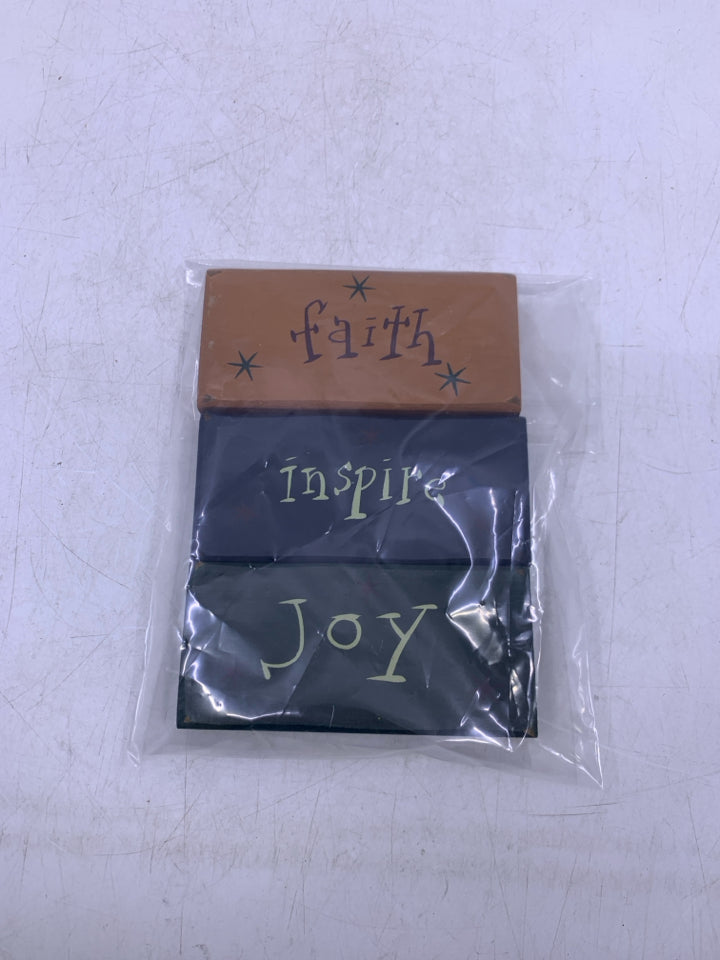 3 PRIMITIVE STYLE WOOD BLOCKS IN BAG.