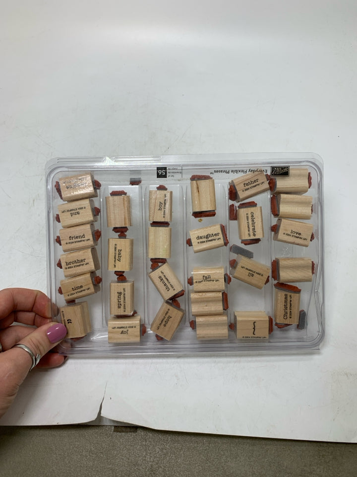 STAMPS IN CASE.