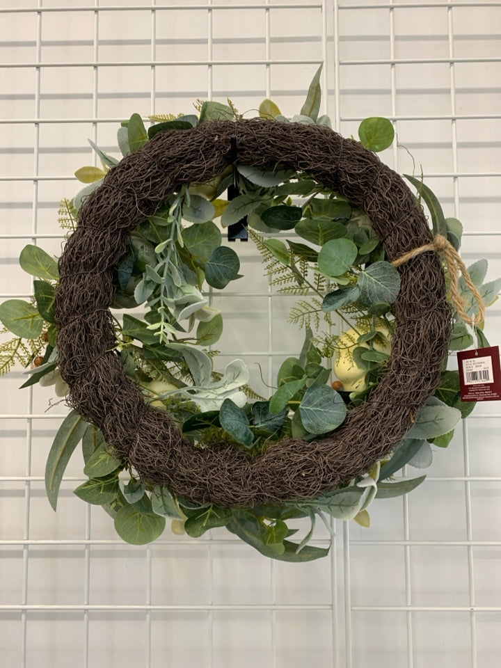 FAUX PUMPKIN AND GREENS WREATH.