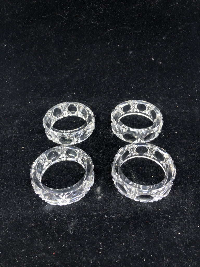 4 PC CUT GLASS NAPKIN RINGS.