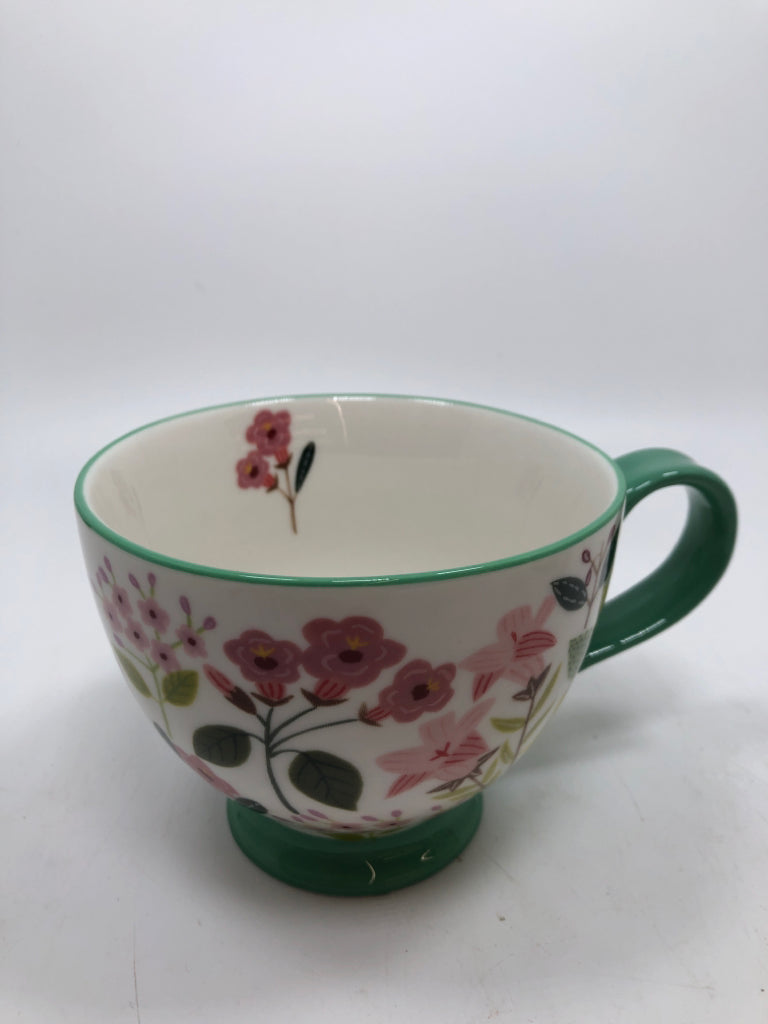 GREEN FLORAL FOOTED MUG.