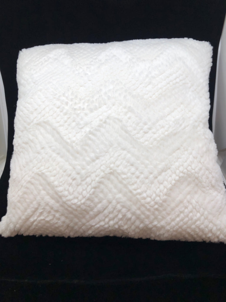 FLUFFY WHITE PILLOW.