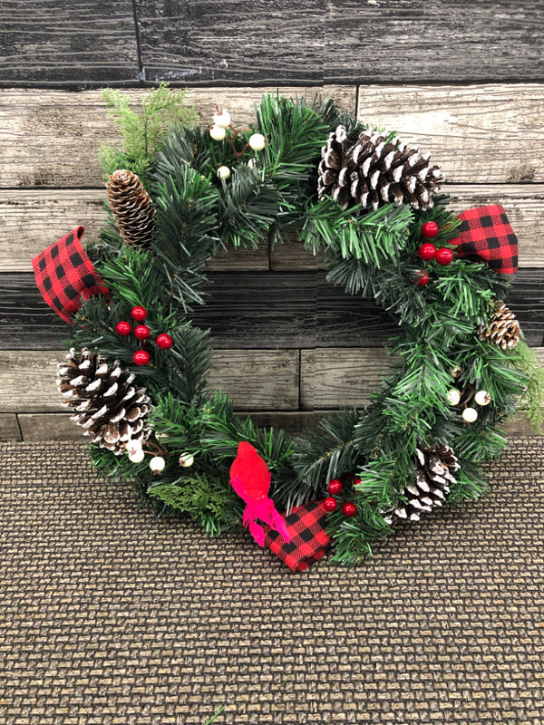 WREATH W FROSTED PINE CONES.