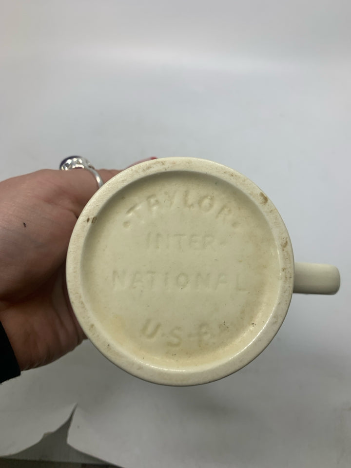 VTG FLORAL SHORT MUG W/ GREEN INSIDE.