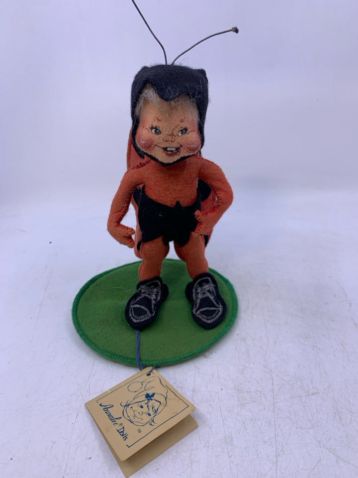 PERSON DRESSED AS LADY BUG.