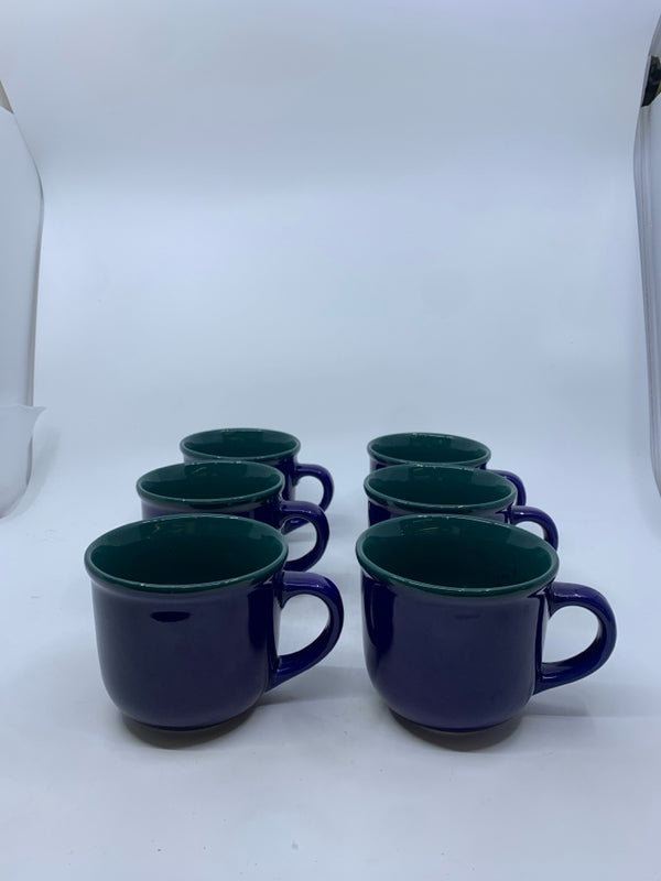 6 BLUE MUGS W GREEN INSIDE.