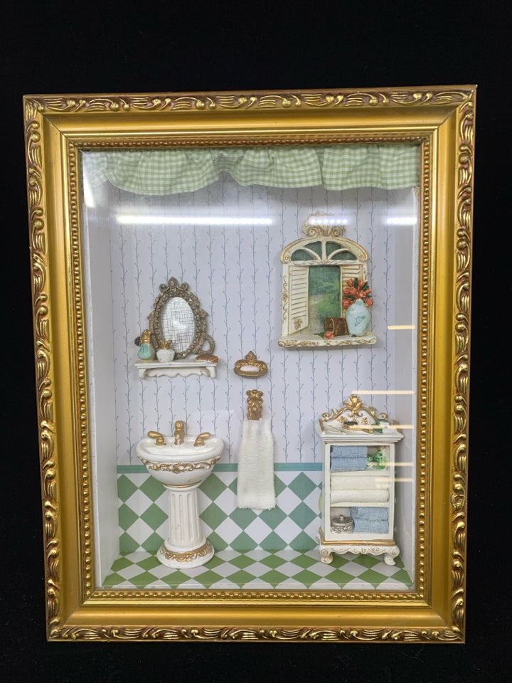 MINIATURE BATHROOM SCENE IN SHADOW BOX W/GOLD FRAME.