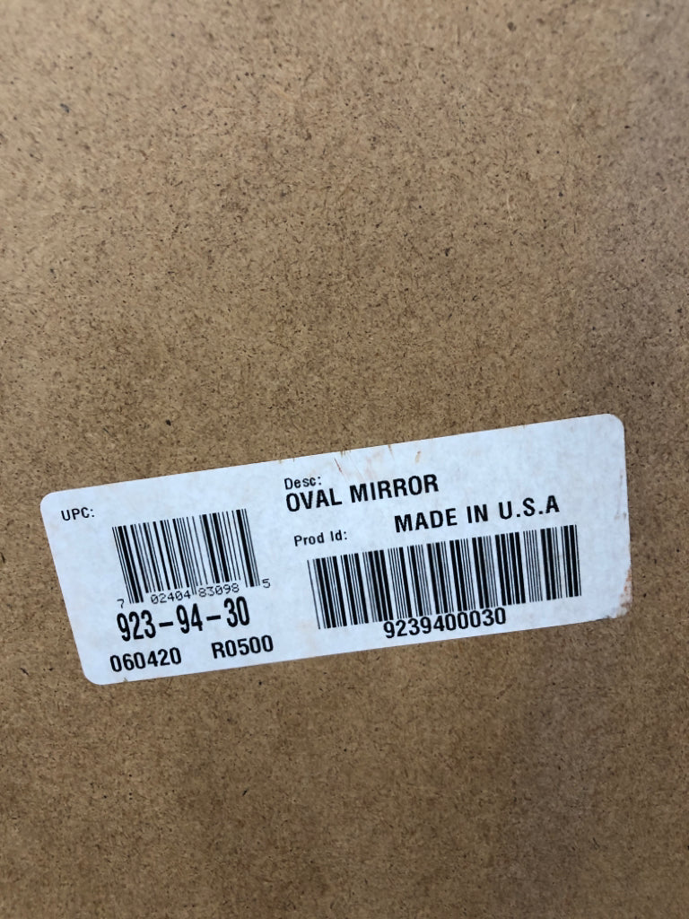 OVAL WHITE MIRROR W/ DECORATIVE TOP.